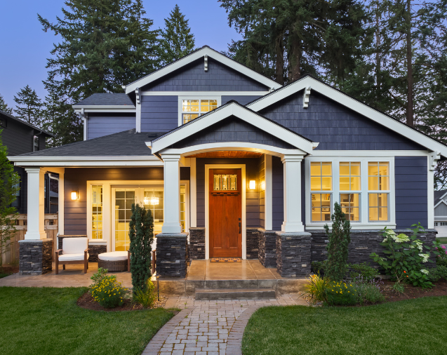A single-family home at dusk, from the Boss Mortgage image library