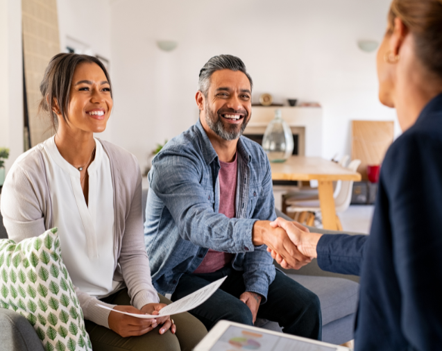 Borrowers meeting with a loan originator, from the Boss Mortgage image library